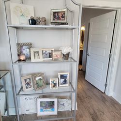 Silver bookcase with glass shelves
