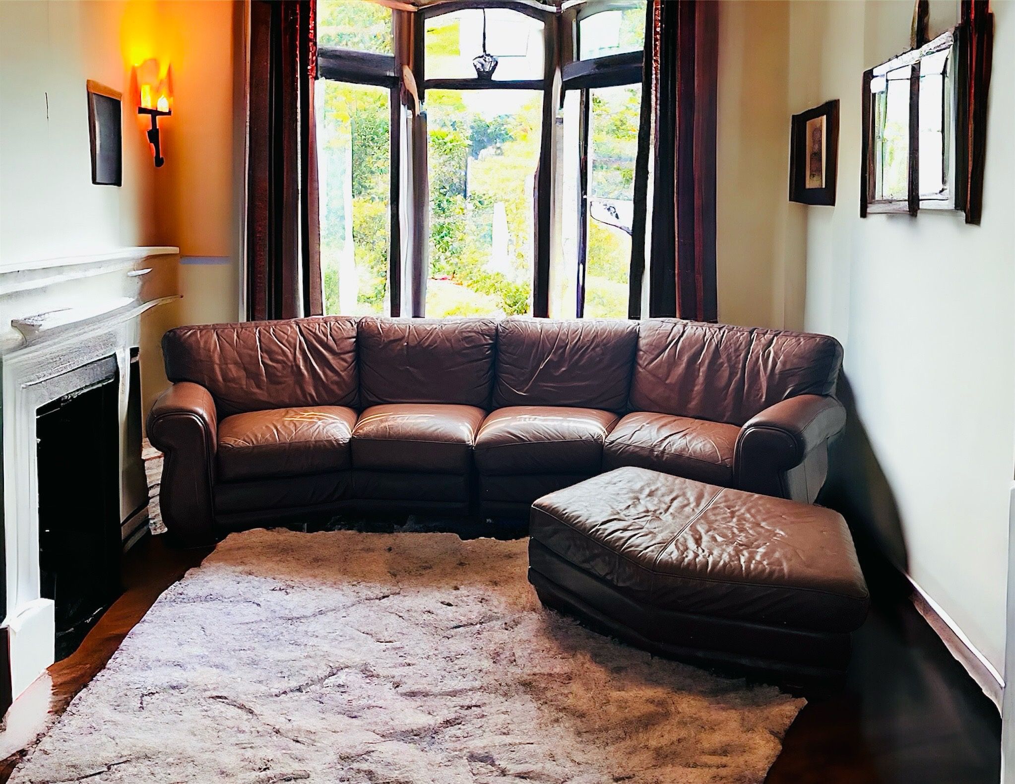 Vintage Brown Leather Couches with A Single Ottoman 