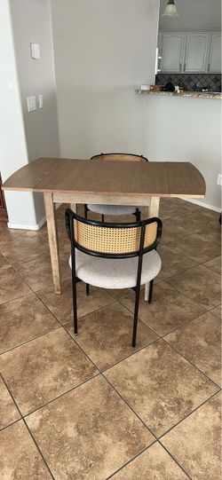 Drop leaf table and two chairs