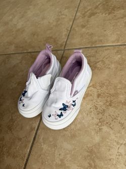 White butterfly Vans 