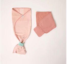 Taking Cara babies swaddle