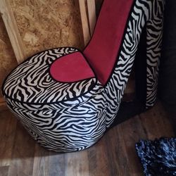 Big high heel chair. In glass top for table, free must pick up Dade City, Florida.