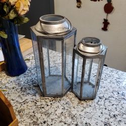 Both  Lanterns / Small Lantern  Is Missing A Glass