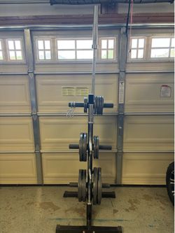 Weights, weight rack, barbell, ez curl bar, weight clips