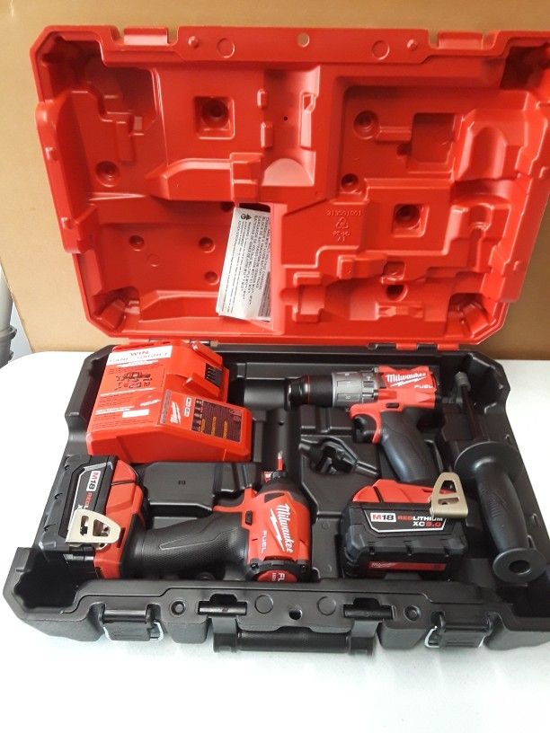Milwaukee Fuel Drill And Impact Driver Kit Including Two Batteries, Charger And Case New