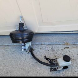 2009/2014 NISSAN BRAKE BOOSTER W/ MASTER CYLINDER & FLUID TANK RESERVOIR OEM