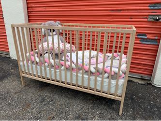Like new IKEA baby crib with mattress