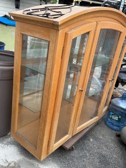 Curio with glass shelves