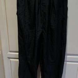 Nike Size M black nylon track pant elastic cuff side pockets & zipper pocket
