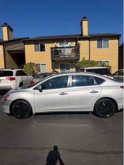 Silver Nissan Sentra 2013