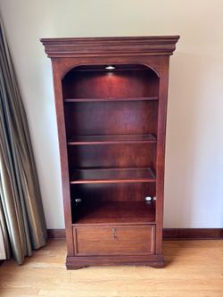 Bookcase with lateral file drawer