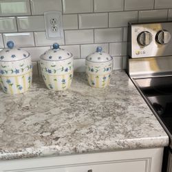 Beautiful  Pfalzgraff Cannister Set.  Only three Cannisters Came With the Set.  Excellent Condition.  No Chips.