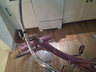 Girl purple beach cruiser 24 in