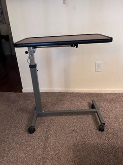 Adjustable over bed table