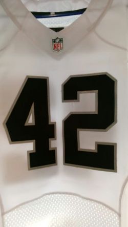 Raiders jersey white Joseph, i have 2 40 and a 44