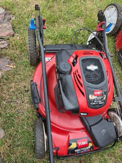 Toro stow and go mower.   Bigger 190 cc