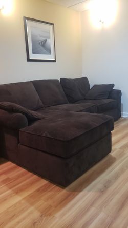 Beautiful L-shaped down feather couch