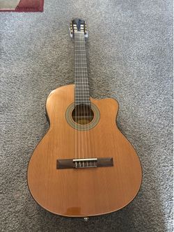 Lucero Guitar (needs repairs)