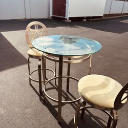 Beautiful set of  Modern Swivel Stool with Round Back – in Brushed Steel 2 hight chairs & glass tab