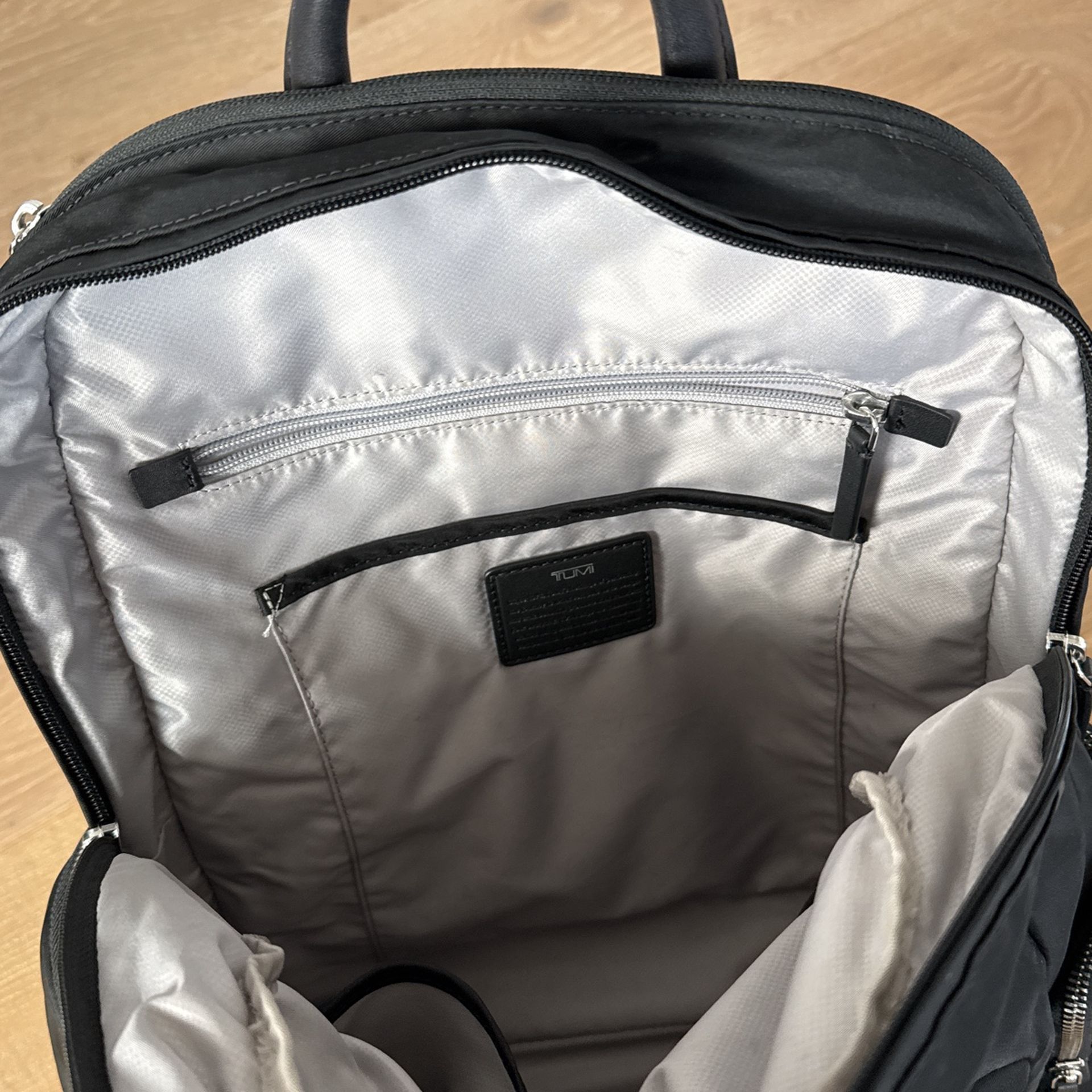 tumi backpack silver Alpha Bravo Navigation Khaki The TUMI Voyageur Celina Backpack in the color Thyme is a versatile travel and everyday backpack designed for organization and durability Tumi Gray Backpack with Silver