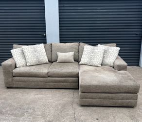 Tan L shape sectional with chaise