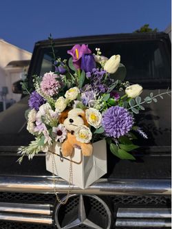 Artificial Floral Arrangement with Plush Dog in Gift Bag