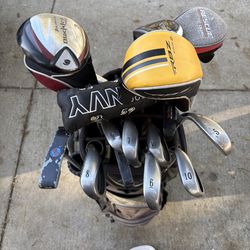 Assortment of golf clubs