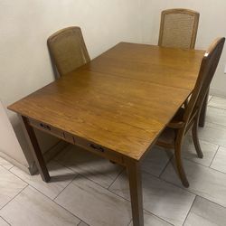 Wood Table With Two Arm Chairs And One Regular 