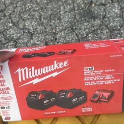 milwakee batteries 2 5.0 and charger