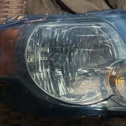 Brand new 2008-2012 ford escape headlight 