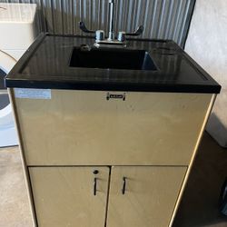 Jonti-Craft Clean Hands Helper portable sink.