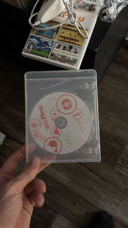 Nice Wii comes with 2 games a controller and to add on controller