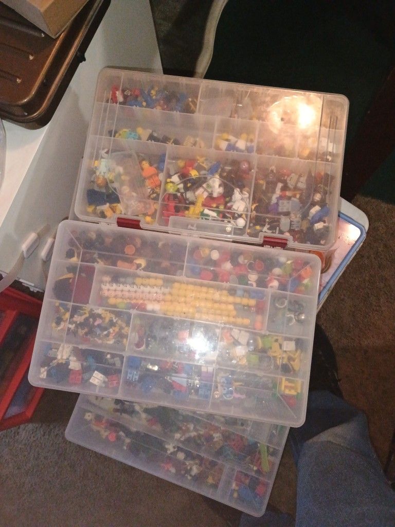 Organized Tackle Box Of Lego Minifigures And Accessories