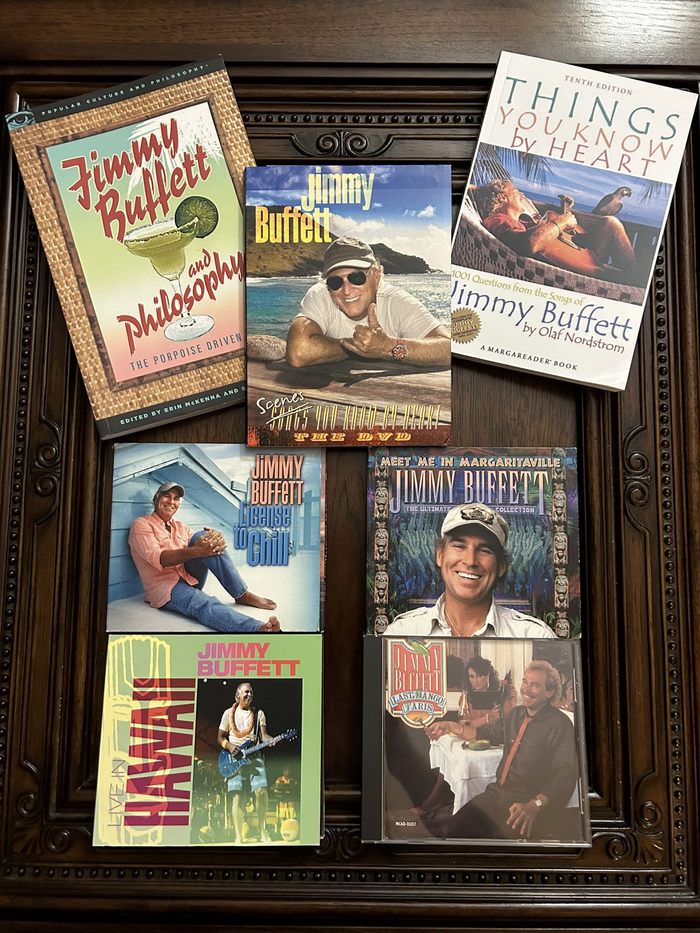 Jimmy Buffett Bundle/2 New Books/1 Used DVD/4 Used CD’s