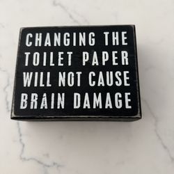 Changing the toilet paper box sign