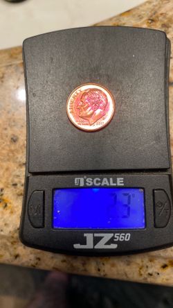 Golden red dime