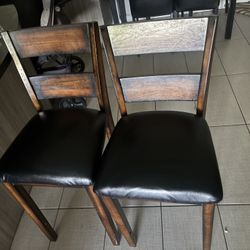 two wooden chairs 
