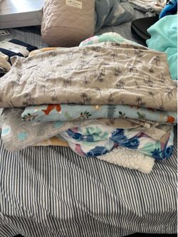 Receiving blankets and two blankets