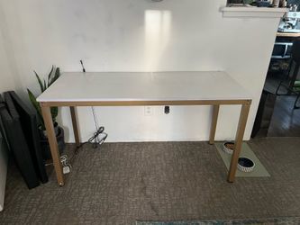 White table gold trim and legs