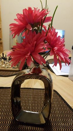 Pink flowers silver vase