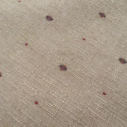 Tan Upholstery Weight Fabric With Dots. 