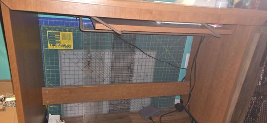 Sewing machine and table