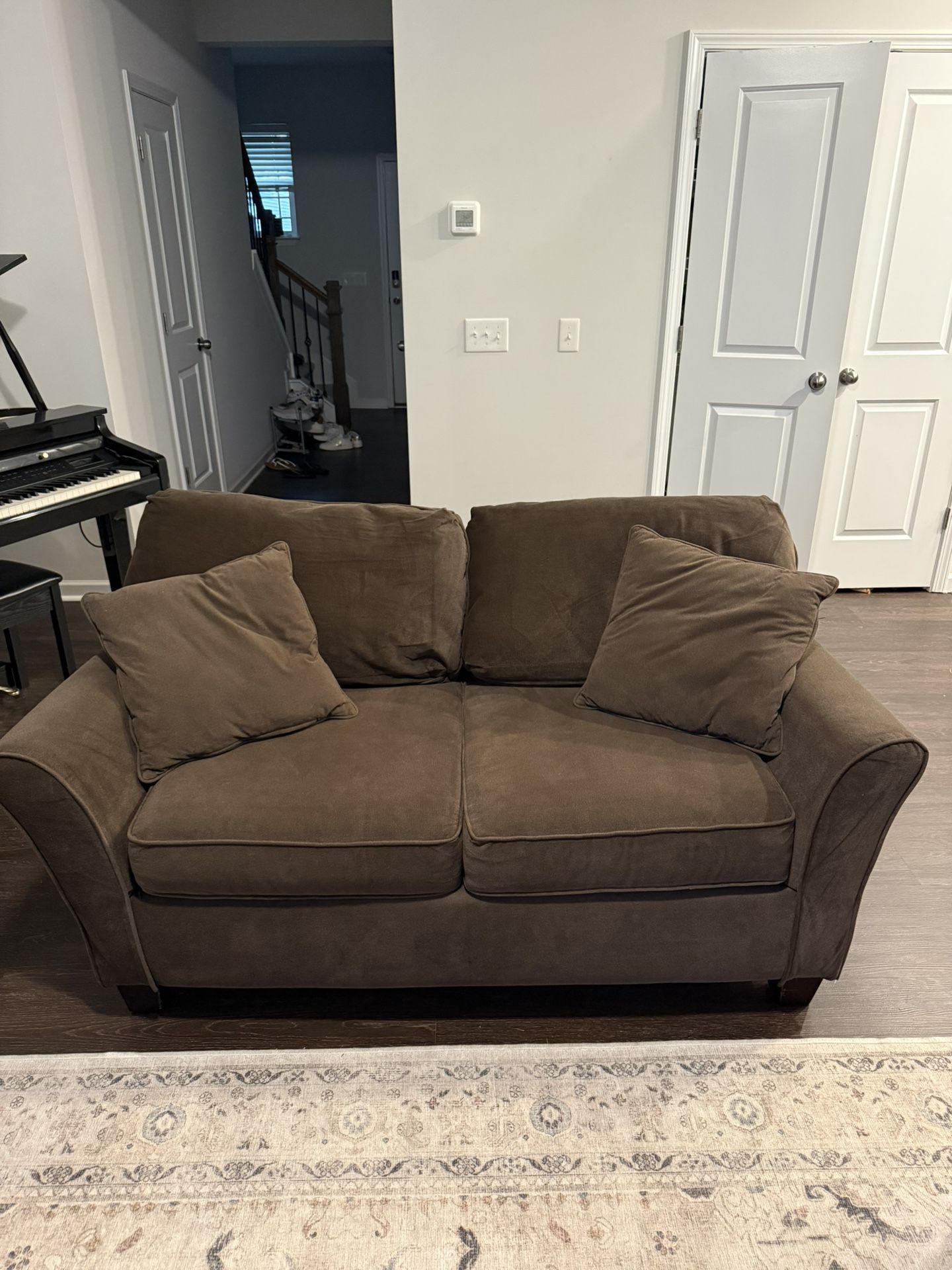 Brown loveseat