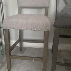 Three Gray Chairs 