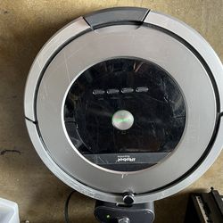 iRobot Roomba Vacuum Cleaning With Charger Station