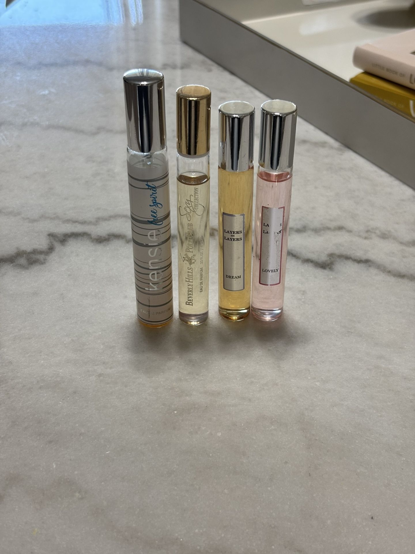 4 Mini Perfumes $5