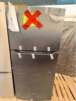 Black Frigidaire refrigerator with warranty