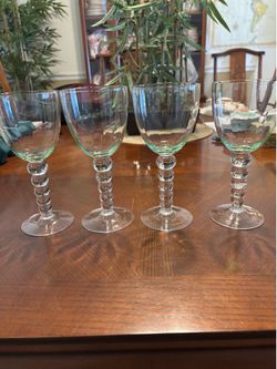 Four Pale Green and Clear Wine Glasses