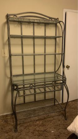 Wrought Iron Rack with Glass Shelves. Wine glasses