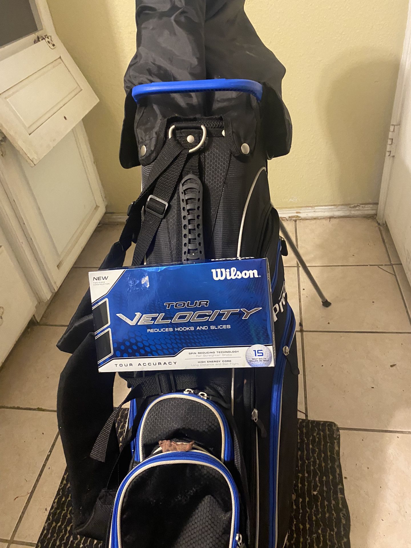 Golf Bag With Golf, Clubs And Golf Balls